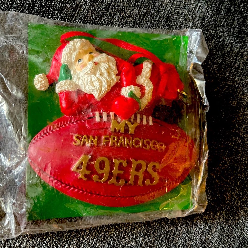 Team NFL 49ers Santa Claus tree ornament.